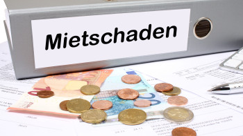 Grauer Order mit der Aufschrift Mietschaden 