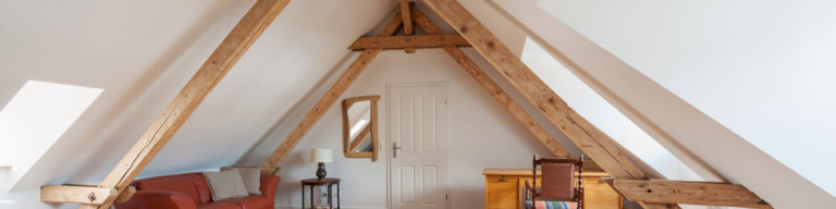 Ausgebautes Dachgeschoss mit offenen Balken